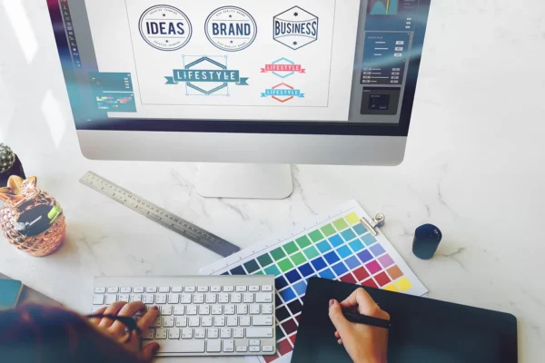 Graphic designer creating custom logo concepts and brand identities